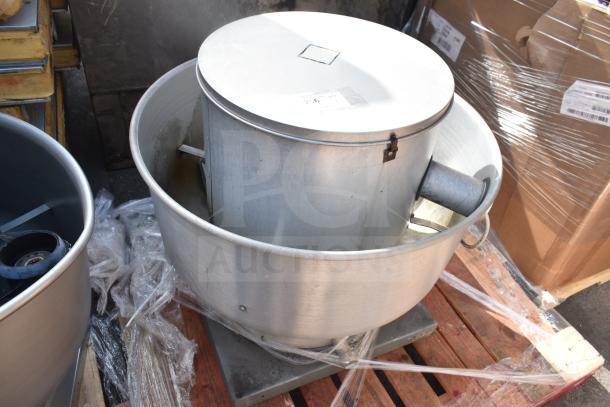 CaptiveAire commercial rooftop mushroom exhaust fan, metal construction, mounted on a pallet, in good condition.