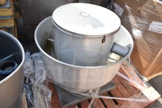CaptiveAire commercial rooftop mushroom exhaust fan, metal construction, mounted on a pallet, in good condition.