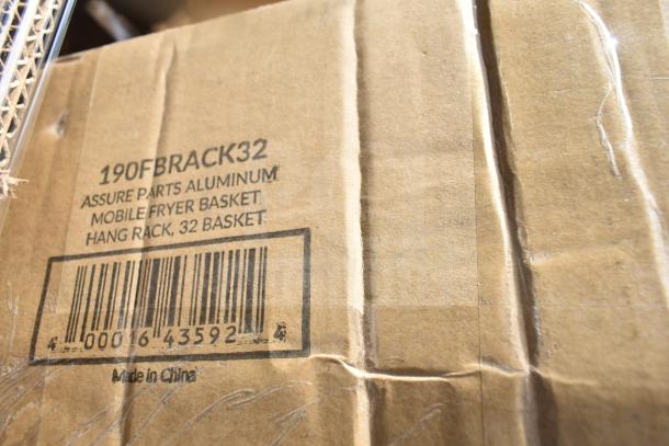 Cardboard box with label "190FBRACK32 Assure Parts Aluminum Mobile Fryer Basket Hang Rack, 32 Basket," includes barcode.