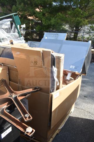 18 scratch and dent items including sink and table in large box. Cardboard labeled "APR-3." Items appear unused.