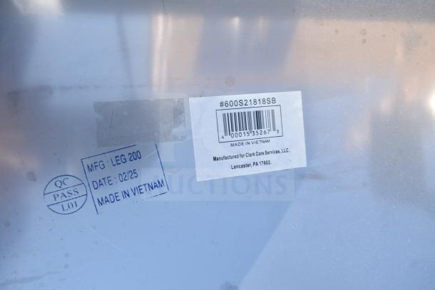 Barcode label with #600S21818SB for Clark Core Services; QC pass, MFG: LEG 200, date 02/25, made in Vietnam.