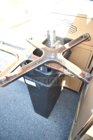 Rusty metal table base on black poly trash can, label marked "2564". Part of a 5-item auction lot.