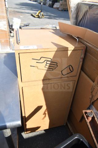 Wooden trash can shell with deposit hole and door. Features hand and cup graphic. Item number 260 displayed.