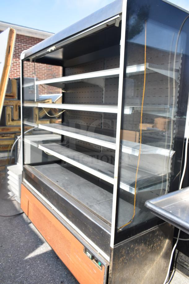 Commercial Grab N Go Merchandiser with glass front, multiple shelves, and lower refrigerated section. Used condition.