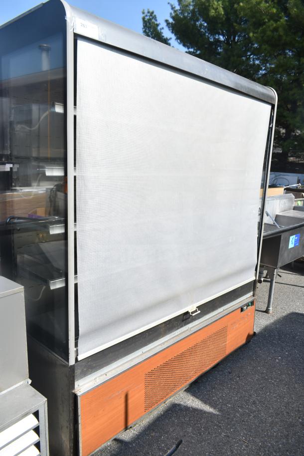 Commercial Grab N Go Merchandiser with roller shade, metal frame, visible ventilation panel; used condition.