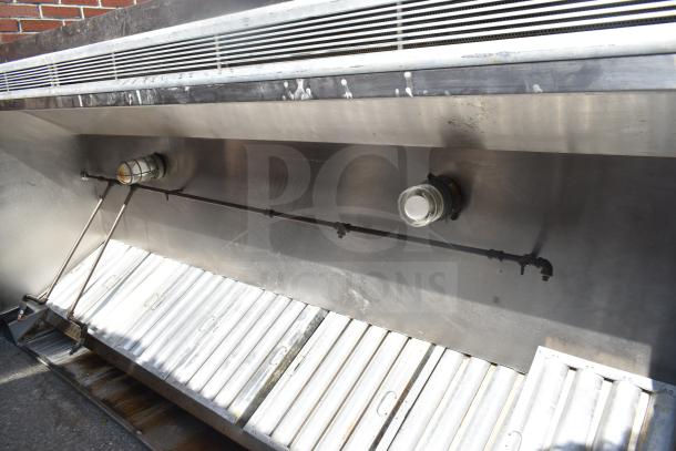 9' commercial grease hood with filters and lights, stainless steel, good condition, suitable for restaurant use.