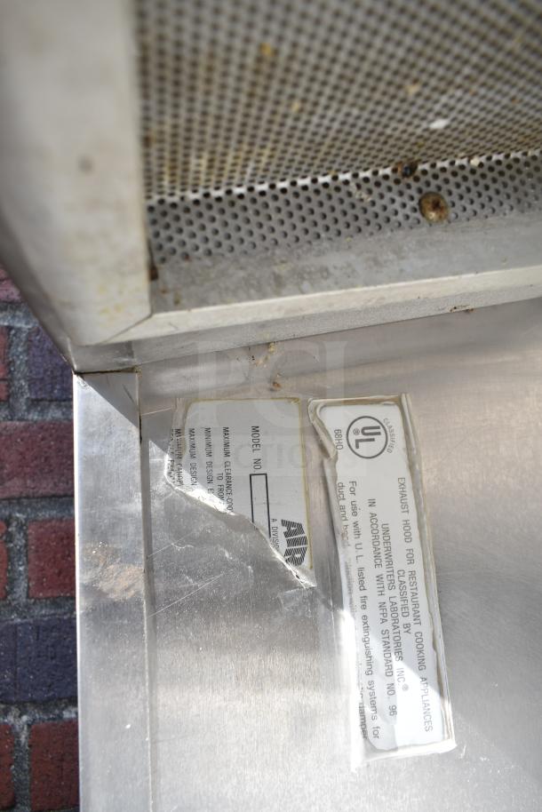 9' commercial grease hood with filters and lights, stainless steel, includes UL label, visible model number tag, good condition.