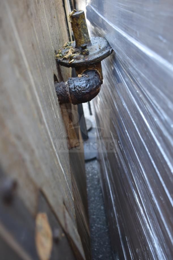 Rusted gas connection of Vulcan Commercial 6 Burner Range, showing wear on the side.