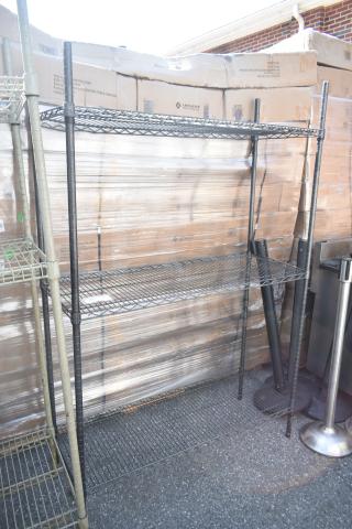 Black finish 3 tier wire shelving unit, sturdy, must dismantle for transport. Consider freight charges; PCI will not dismantle.