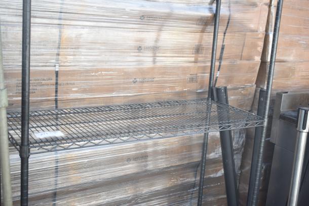 Black finish 3 tier wire shelving unit, sturdy metal construction, good condition. Buyer must dismantle for shipping.