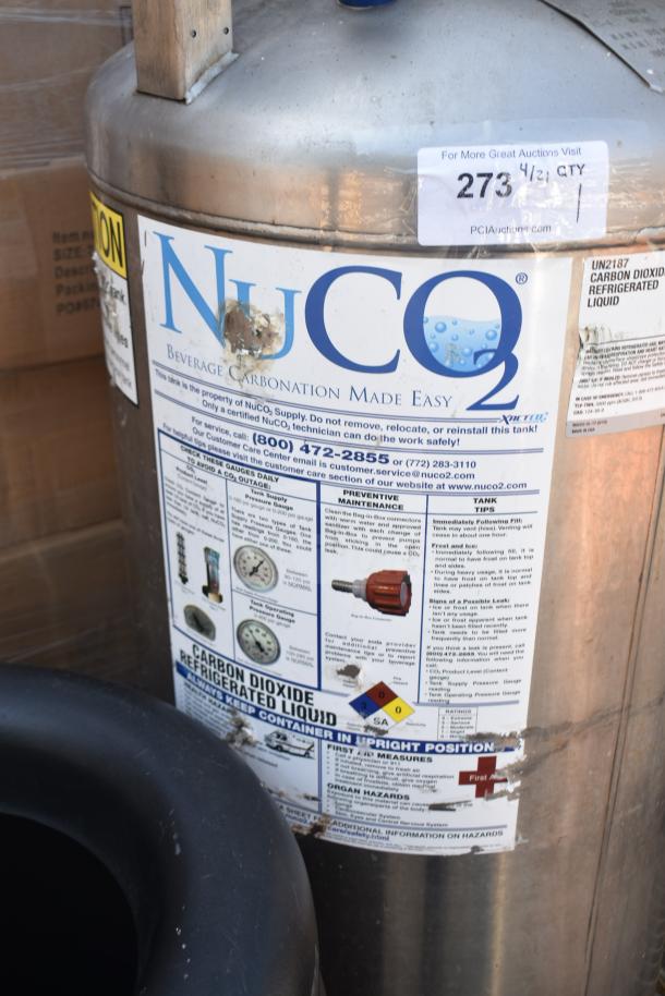 NuCO2 Beverage Carbonation Tank with labels detailing service and safety information, pickup required, no shipping available.