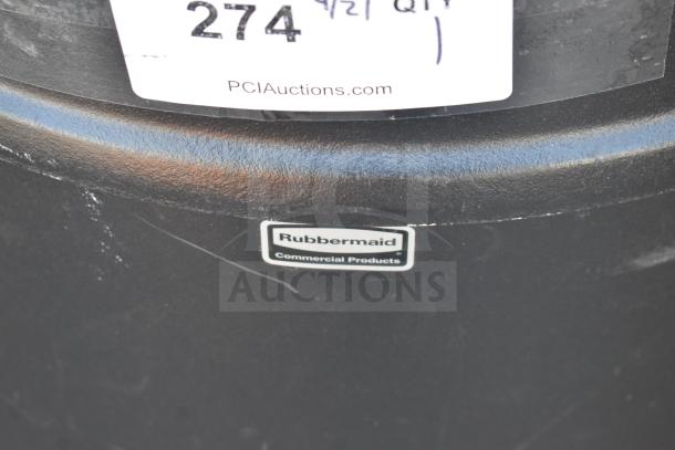 Rubbermaid Trash Can, commercial-grade, black, visible Rubbermaid logo, minor surface wear. Auction tag present.