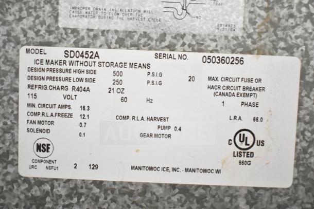 Manitowoc SD0452A ice machine label, showing specs: 115V, 1 phase, R404A refrigerant, Model SD0452A, serial 050360256.