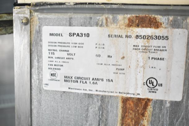 Manitowoc SD0452A ice machine head on dispenser, 115V, 1 phase. Label shows model SPA310, 15A max circuit, UL listed.