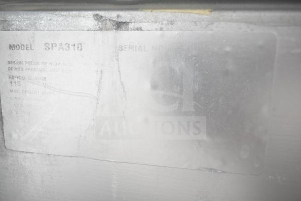 Manitowoc commercial ice machine with hotel dispenser, model SD0452A, 115V, 1 phase, visible wear on label.