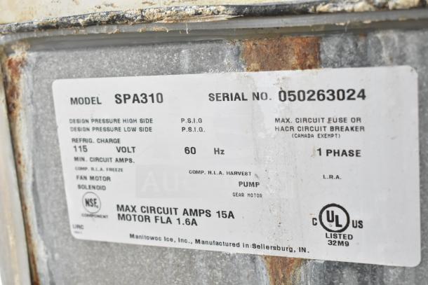 Manitowoc SD0452A commercial ice machine head with hotel dispenser, 115 volts, 1 phase. Includes visible model and serial tags.