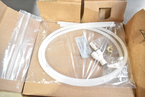 BRAND NEW Insinkerator HWT-00 Instant Hot Water Tank, scratch and dent, includes installation hoses, original packaging.