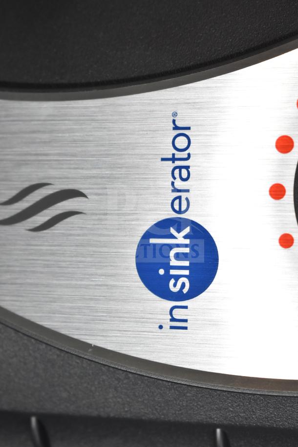 BRAND NEW Insinkerator HWT-00 Instant Hot Water Tank with minor scratches. Stainless steel finish, logo visible.