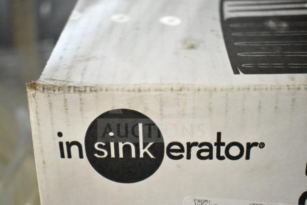 Insinkerator Cover Control Plus 3 Garbage Disposal in original box. Features 120 volts, 1 phase. Box shows logo and details.
