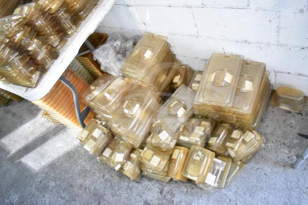 Large lot of brand new amber drop-in bin lids, models FG202P22AMBR, FG221P86AMBR, for tabletop and floor use.