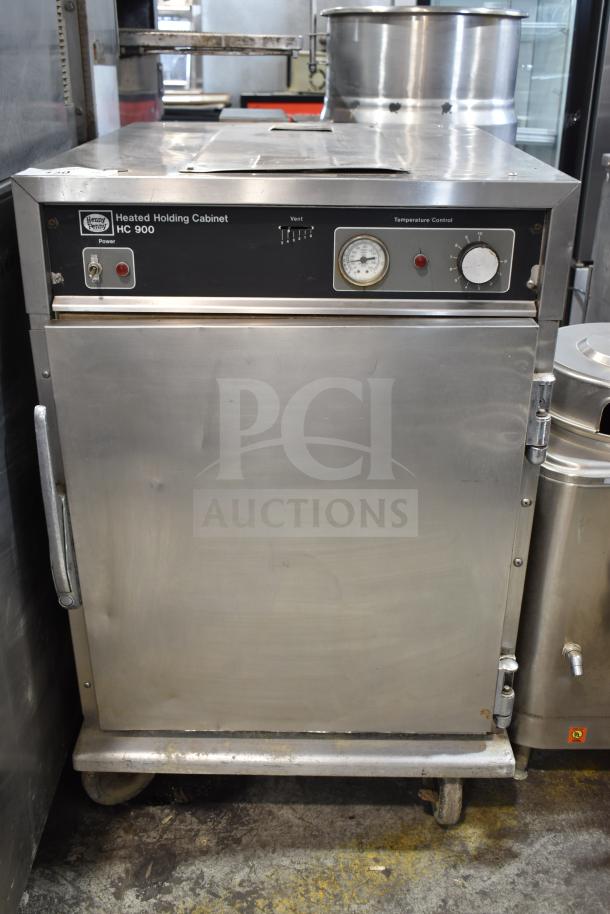 Henny Penny HC900 commercial heated holding cabinet on casters, stainless steel, temperature control dial, 115V, 1 phase.