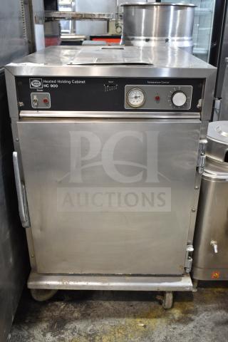 Henny Penny HC900 commercial heated holding cabinet on casters, stainless steel, temperature control dial, 115V, 1 phase.