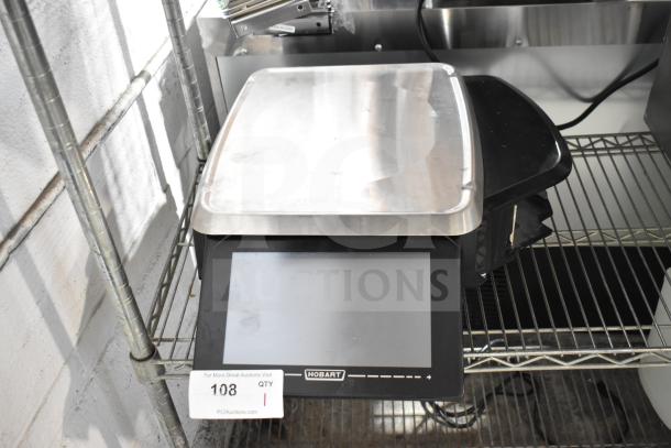 2025 Hobart HTi-7LH4W commercial countertop food portioning scale, tested, no power cord, black and stainless steel.