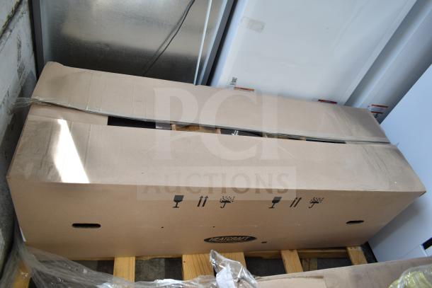 New Bohn BEL0130CC6EEAYF859 evaporator fan in original packaging. 280 volts, 3 phase. Box shows handling symbols.