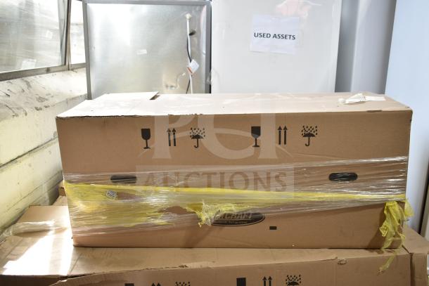 Brand new Bohn BEL0650AG6AMAD2107 evaporator fan in box, 115 volts, 1 phase, packaging intact, clear shipping icons.
