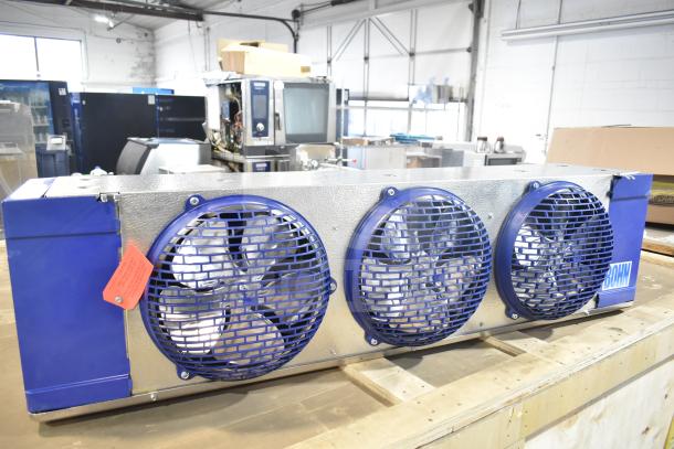BRAND NEW Bohn BEL0130CC6EEAYF859 evaporator fan, 280V, 3-phase, with blue casing and protective grills.
