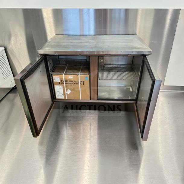 Brand new True TUC-48F-HC ADA undercounter freezer, stainless steel, 48.5", two doors, two sections, visible box inside.