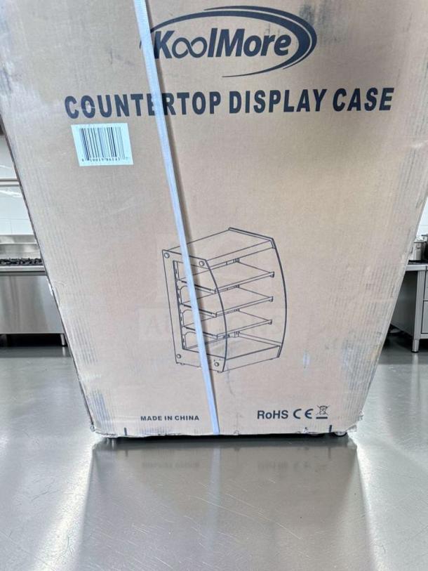 KoolMore DC-3CB Countertop Display Case in box, brand new condition, commercial LED pastry merchandiser.