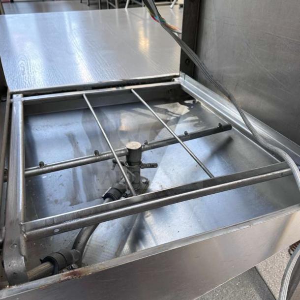 ADS AF-ES Energy Star pass-thru dishwasher interior showing stainless steel components, pristine condition, model ADS-L-DISH-0873.