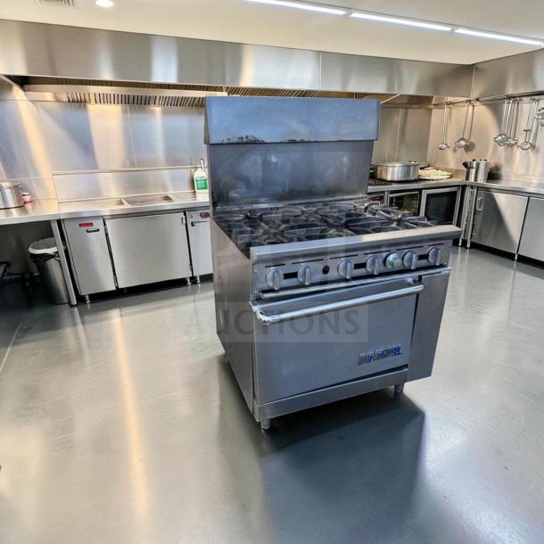 Exceptional condition Imperial IR-6 36" commercial gas range, six burners, oven, natural gas, fully operational.