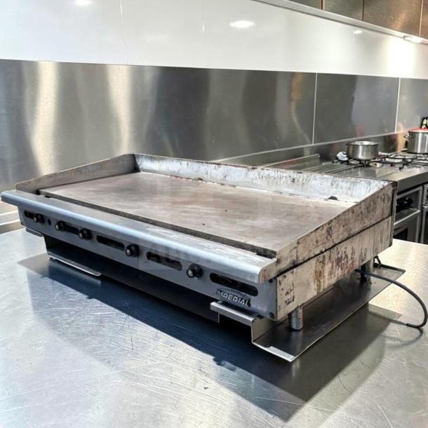 Imperial ITG-60 60" commercial gas griddle, 1" steel plate, thermostatic controls, superior condition, natural gas.