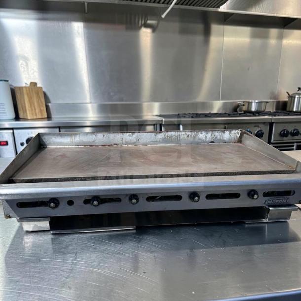 Imperial ITG-60 60" commercial gas griddle with 1" steel plate, thermostatic controls, tested and operational, in superior condition.