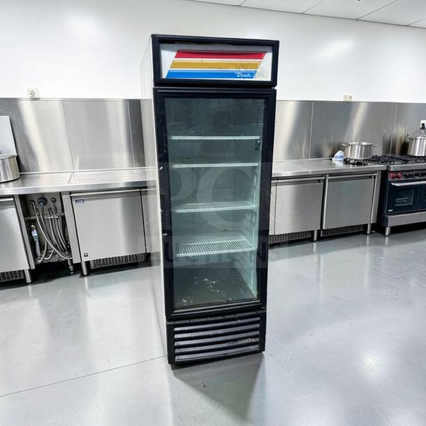 True GDM-23-HC, 27" commercial glass door merchandiser, single section, black, LED lighting, excellent condition.