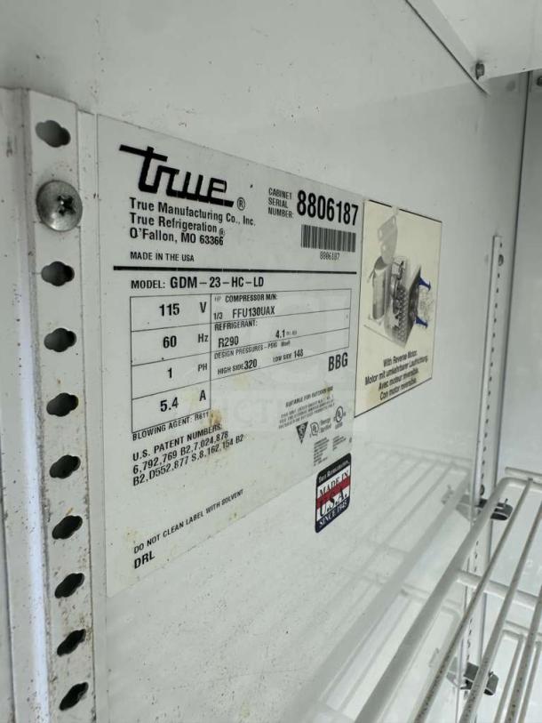 True GDM-23-HC merchandiser label showing electrical specs, model info, and "Made in USA" marking.