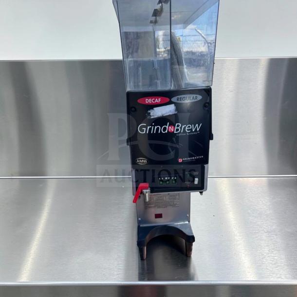 Grindmaster GNB-20H coffee system, dual hopper, airpot brewer, 120V, excellent condition, tested, labeled "Decaf" and "Regular".
