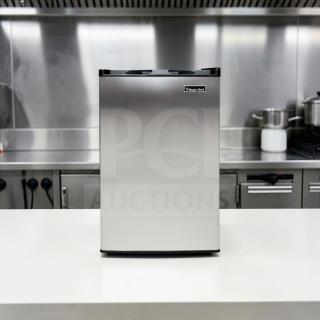 Magic Chef MCUF3S2 3 Cu. Ft. stainless steel compact upright freezer in excellent condition, fully tested, space-saving.