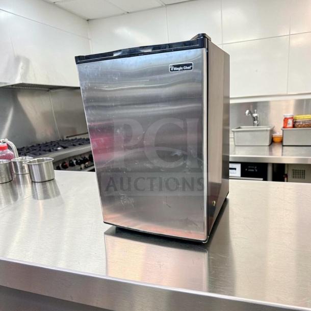 Magic Chef MCUF3S2 3 Cu. Ft. compact upright freezer in stainless steel; excellent condition, space-saving, fully tested.