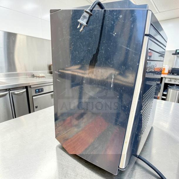 Euro-Gold W-995 compact undercounter refrigerator, black, scratched surface, 115V plug, fully tested. Model EUR-S-FR-0884.