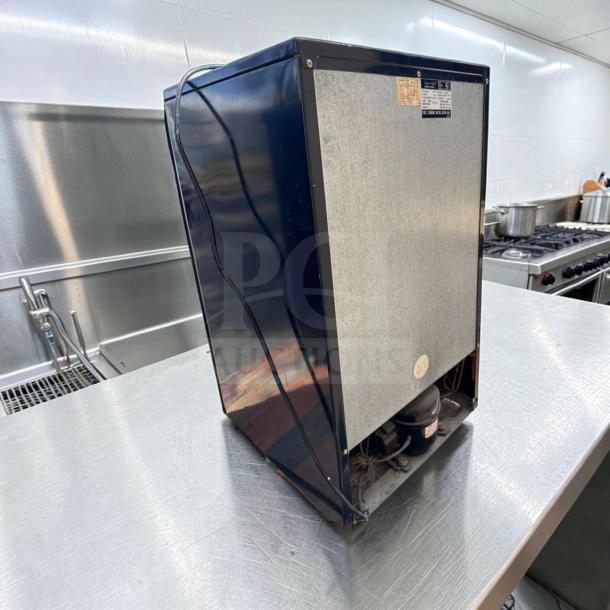 Euro-Gold W-995 compact undercounter refrigerator, fully operational, 115V, in high-quality condition, shown in a kitchen setting.