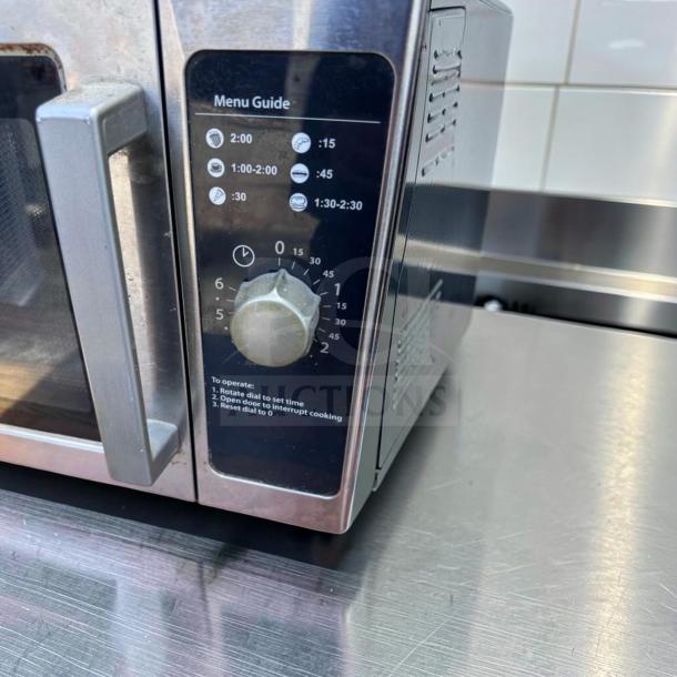 Amana RCS10DS commercial microwave, stainless steel, 1000W, medium volume, exceptional condition, visible menu guide.