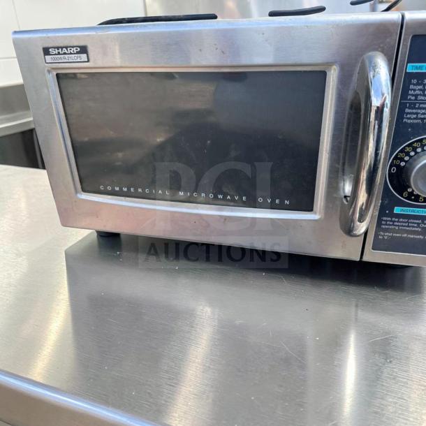 Sharp R-21LCFS commercial microwave oven, stainless steel, 1000W, dial control, 120V, excellent condition, fully tested.