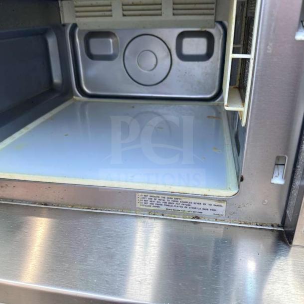 Sharp R-21LCFS Commercial Microwave Oven, 1000W, stainless steel, dial control, fully tested, open door view, top-tier condition.