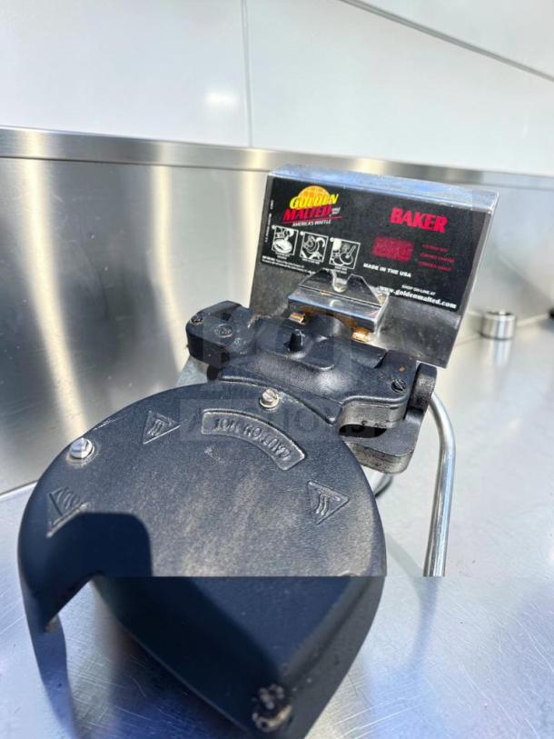 Golden Malted RT-P waffle maker, cast iron plates, built-in timer, outstanding condition, "Made in USA" label visible.