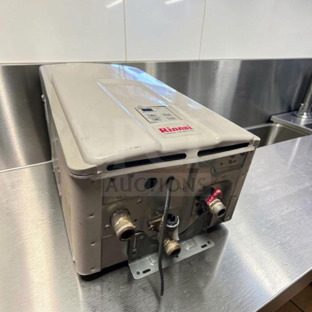 Rinnai V75iN tankless water heater, 7.5 GPM, 180,000 BTU, natural gas, indoor use, excellent condition, fully tested.