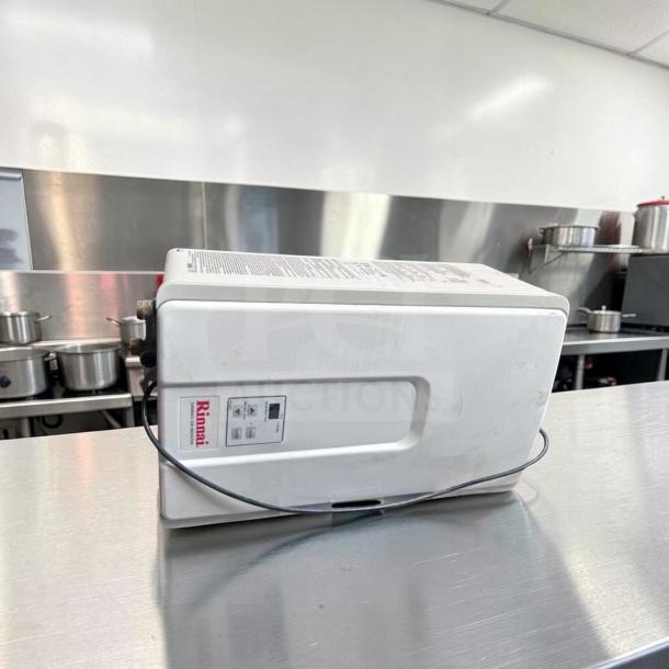 Rinnai V75iN tankless water heater, 7.5 GPM, 180,000 BTU, natural gas, indoor installation, top-tier condition, fully tested.