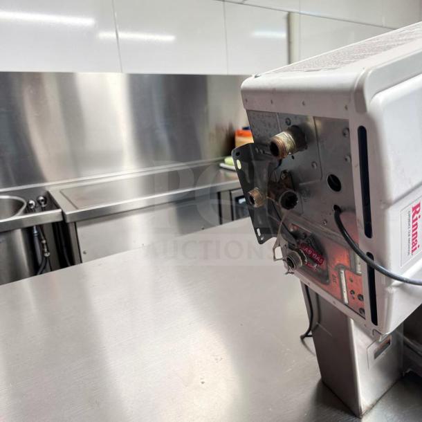 Rinnai V75iN tankless water heater in top-tier condition, 7.5 GPM, 180,000 BTU, natural gas, for indoor installation.